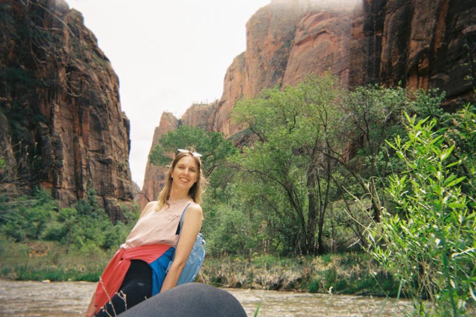 Kinga outdoors among canyon cliffs